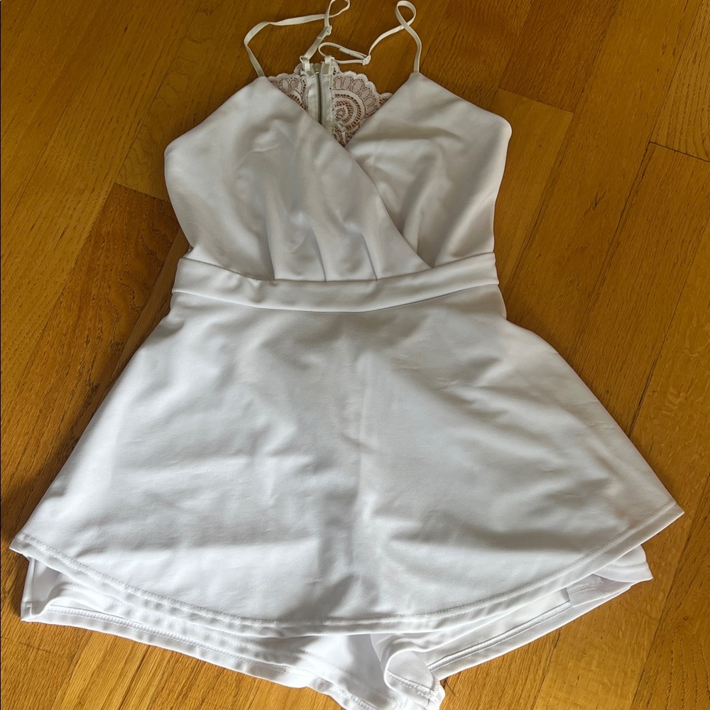 Chic White Romper with Lace Detail